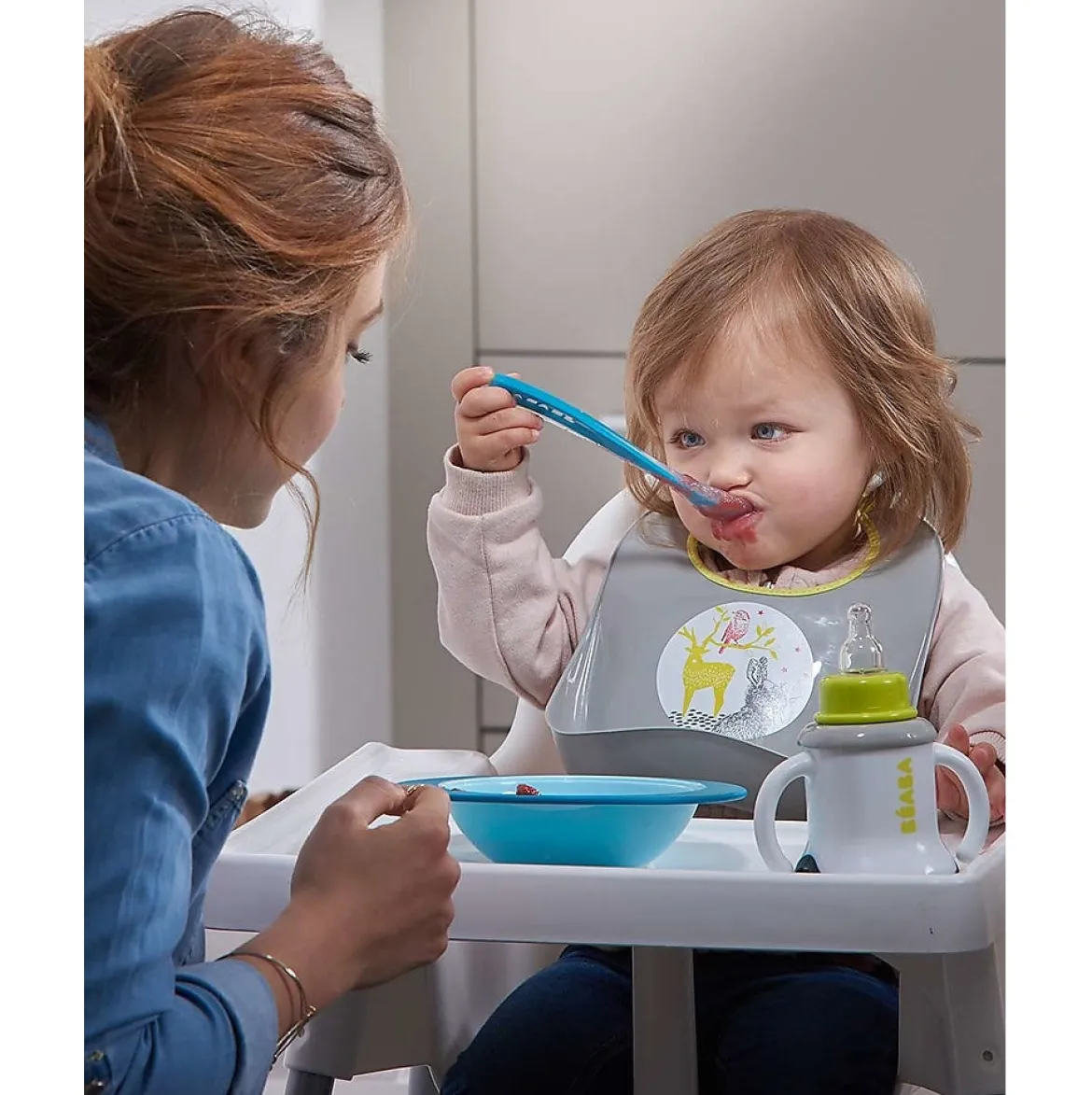 cucchiaio ergonomico prime pappe - silicone - blu - maneggevole per gli adulti e delicato per i bambini