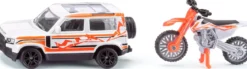 land rover defender con ktm motorbike
